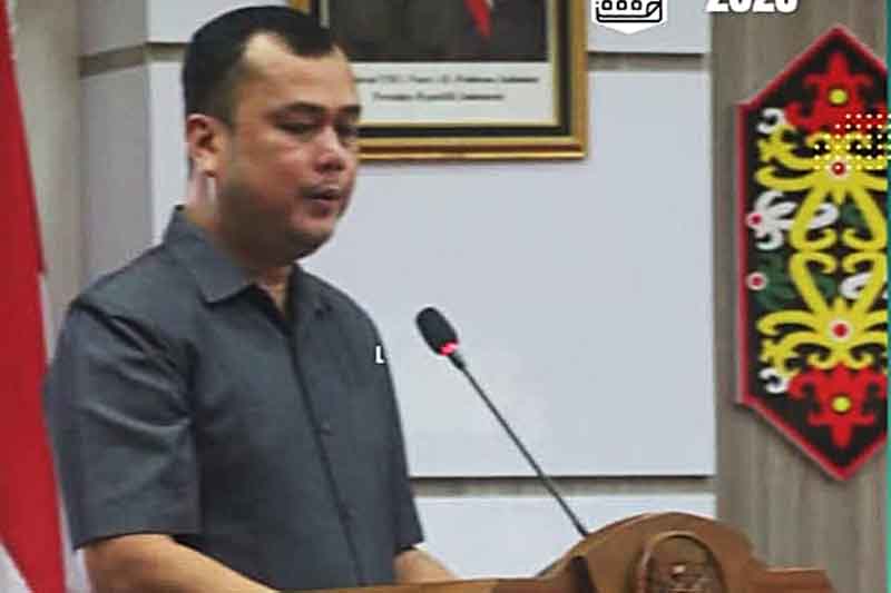 Wakil Ketua 1 DPRD Pulang Pisau Yoppy Satriadi membacakan sambutan