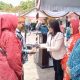 Srikandi Nasdem Serahkan Ambulans untuk Desa Tatas Hilir